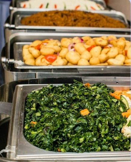 Buffet spread with sides and vegetables
